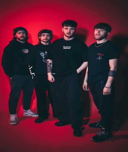 A promotional picture of a band with a red background