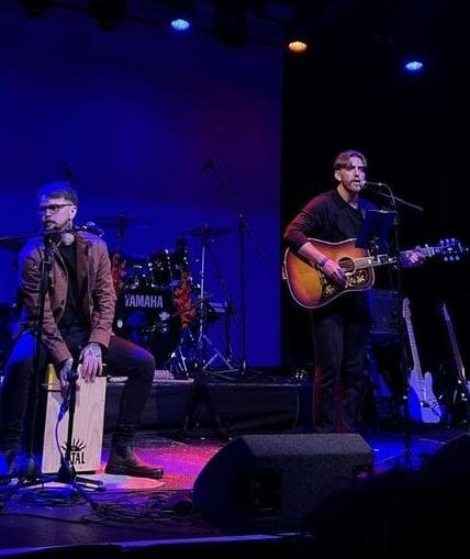 Two musical performers on stage